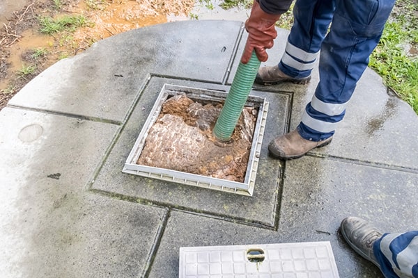 cesspool pumping involves the removal of solid waste and sludge buildup from the cesspool using specialized equipment